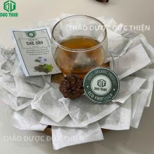 Hình ảnh ly trà dây túi lọc sau khi pha kèm hướng dẫn sử dụng giúp diệt khuẩn HP và giảm đau dạ dày hiệu quả